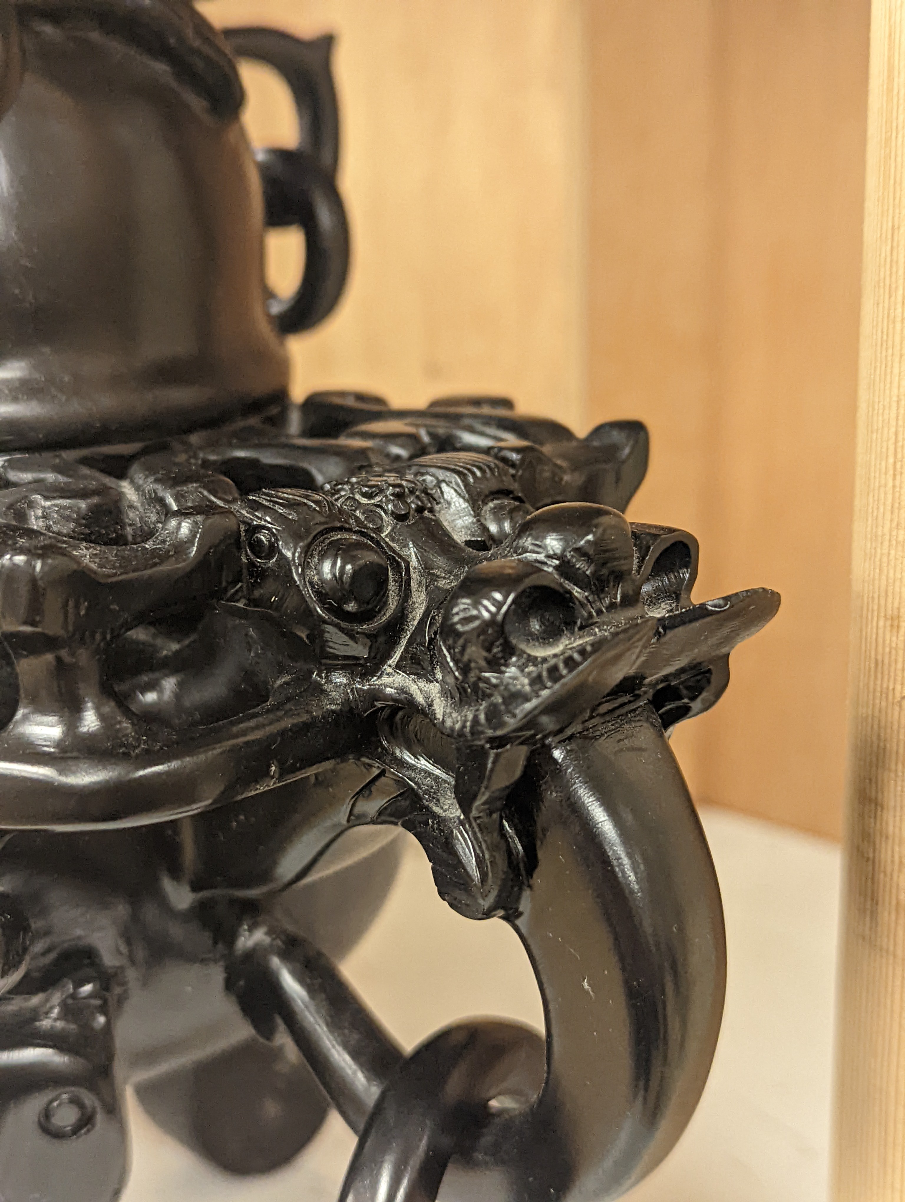 A large decorative Chinese black hardstone tripod censer and cover - 25.5cm high